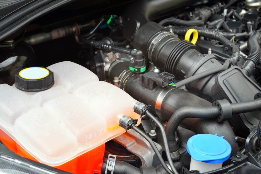 The engine coolant reservoir is usually on the left-hand side of the engine