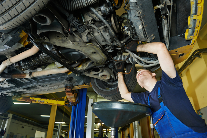 Auto repair courses student at shop