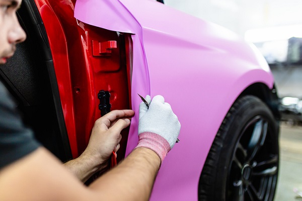 Wrapping a car takes precision and attention to detail