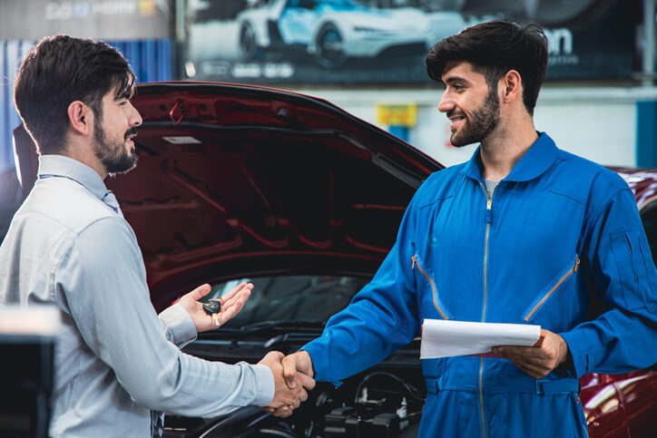 EV mechanic and apprentice in hybrid and electrical mechanic training