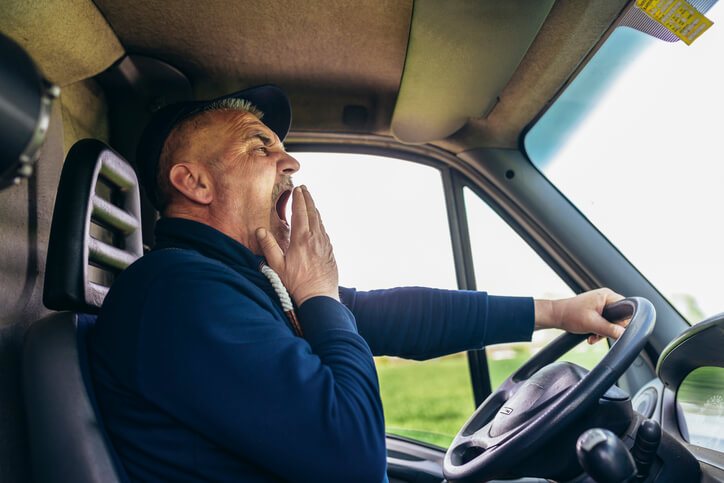 A driver displaying signs of fatigue that an In-Cabin sensor would pick up, as explored in automotive training