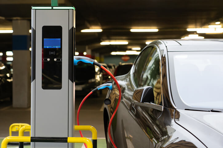 A car charging station repaired by automotive training grad