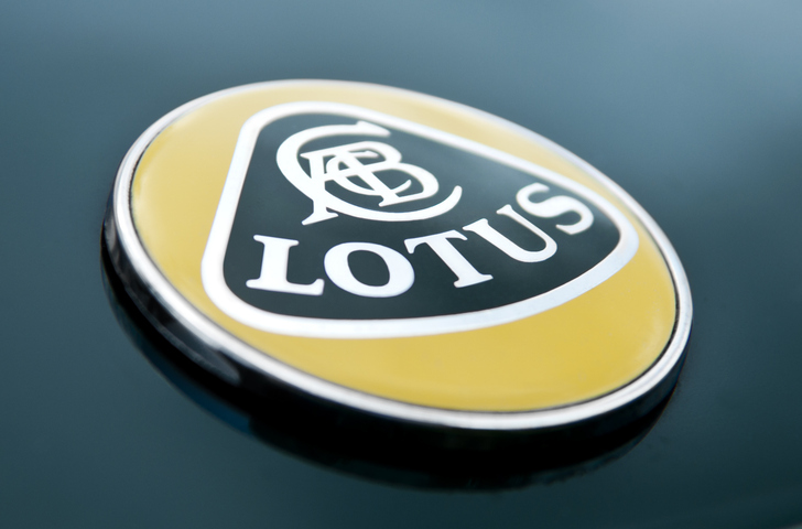 Close-up of the Lotus Elise logo, representing the brand's move toward hybrid and electric vehicle technology