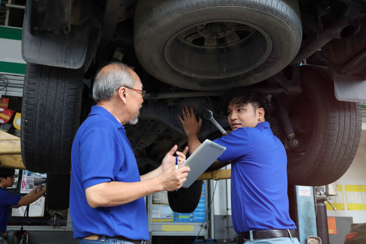 An instructor at ATC Toronto explaining mild hybrid engine components