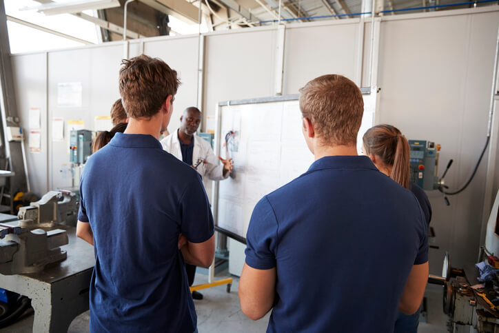 Automotive training class discussing flexible maintenance schedules