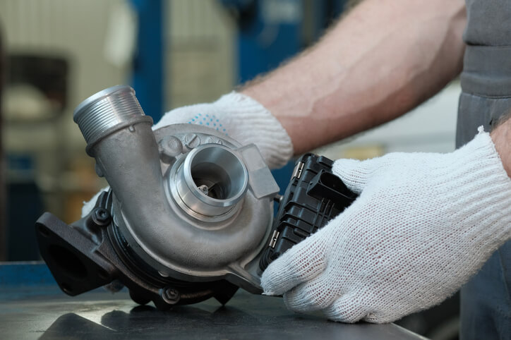 Turbocharger unit on a parts bench during engine diagnostics training