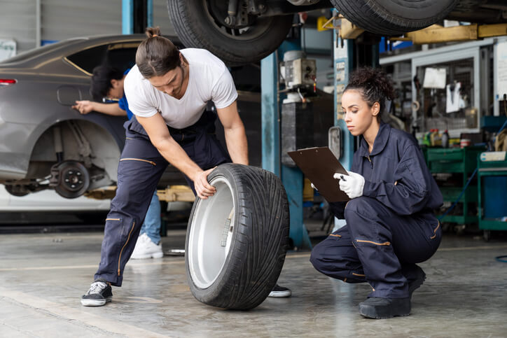 A run-flat tire being inspected at an auto repair shop