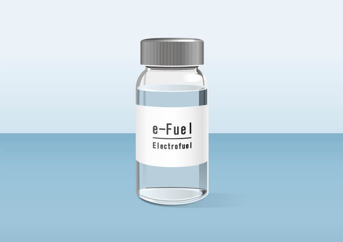 A fuel sample showing the clarity of synthetic e-fuel