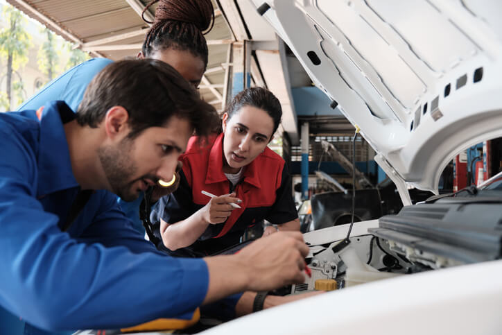 A hybrid and electrical mechanic student learning hybrid and EV maintenance in Montreal.