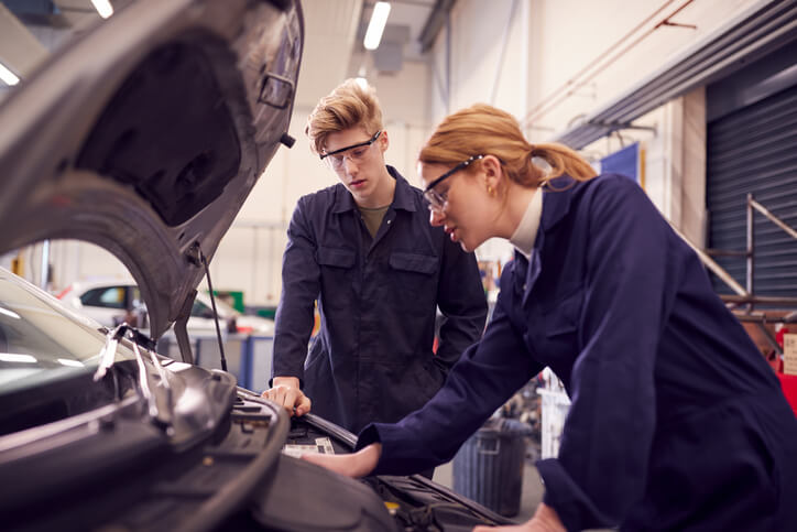 Students participating in hands-on automotive technology training.