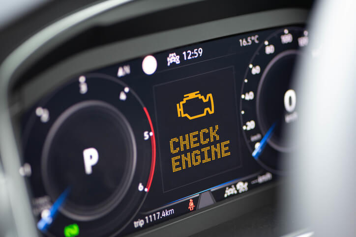 A student in the automotive service technicians and mechanics program, diagnosing a check‑engine light in BC