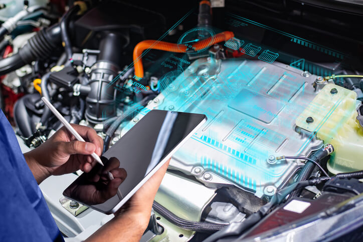 A hybrid electric vehicle service as part of automotive training in Montreal