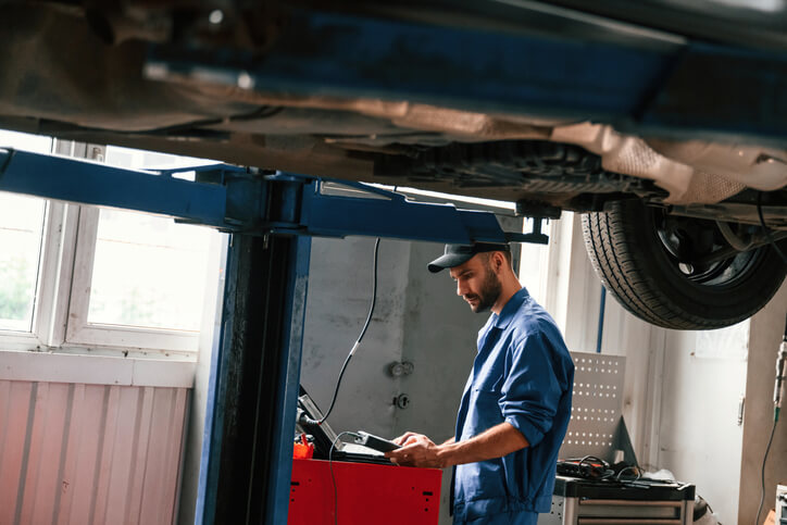 A student at Surrey automotive school gains hands-on experience with hybrid and electric vehicle systems.