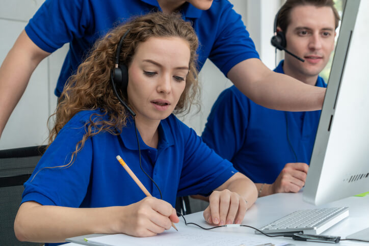 An ATC Surrey student developing organizational and communication skills during dispatch training