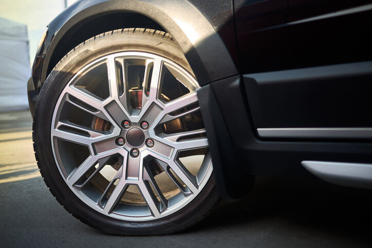 Close-up of run-flat tires used during auto mechanic training at an automotive school.