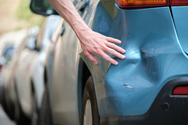 A damaged bumper as seen during auto body training