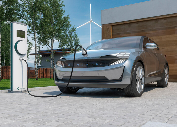 An electric vehicle connected to a bidirectional charging station supplying home backup power