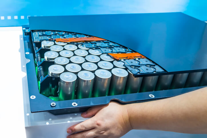 An EV battery pack immersed in dielectric coolant for thermal management