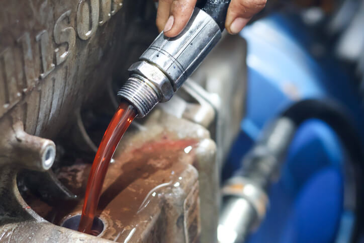 A close-up of clean transmission fluid showing correct colour and condition