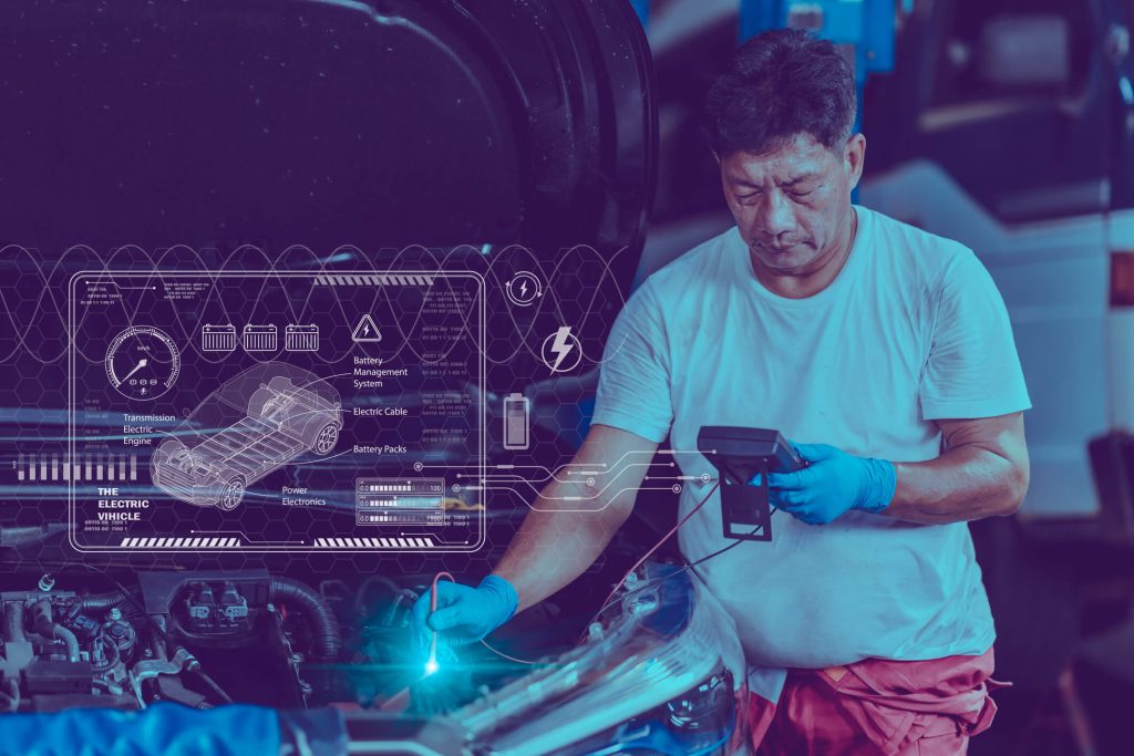 A technician is diagnosing a battery management system in a high-voltage EV battery