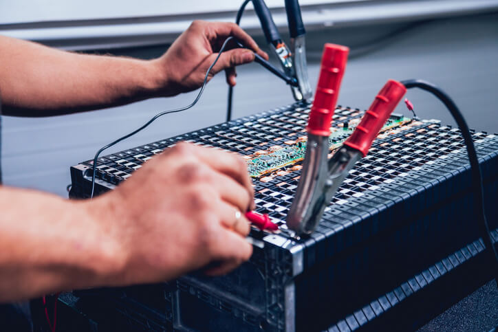 A high-voltage battery system is being tested for insulation