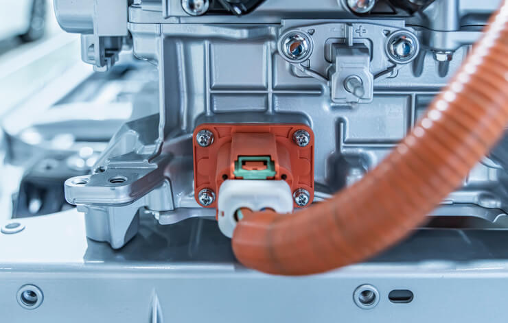 An EV inverter unit mounted in an electric vehicle