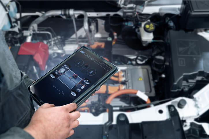 A technician diagnosing a hybrid battery pack after a P0A80 code