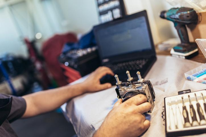 Automotive student learning electronic throttle-control principles