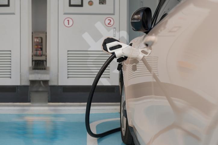 An electric vehicle connected to an ISO 15118-compatible charging station