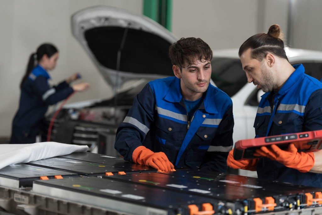 An automotive student learning about Toyota bZ battery preconditioning